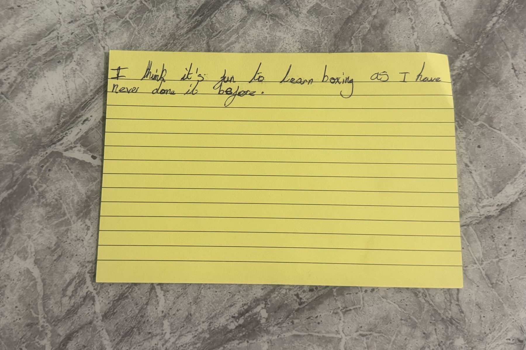 Handwritten feedback card: I think it's fun to learn boxing as I have never done it before.