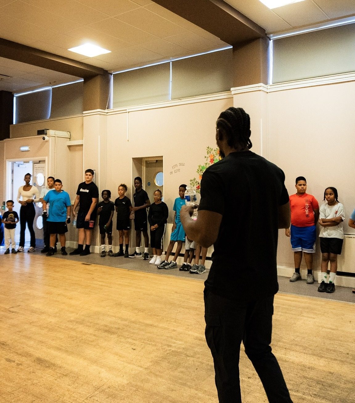 Young people practising boxing combinations at a ClockiT event