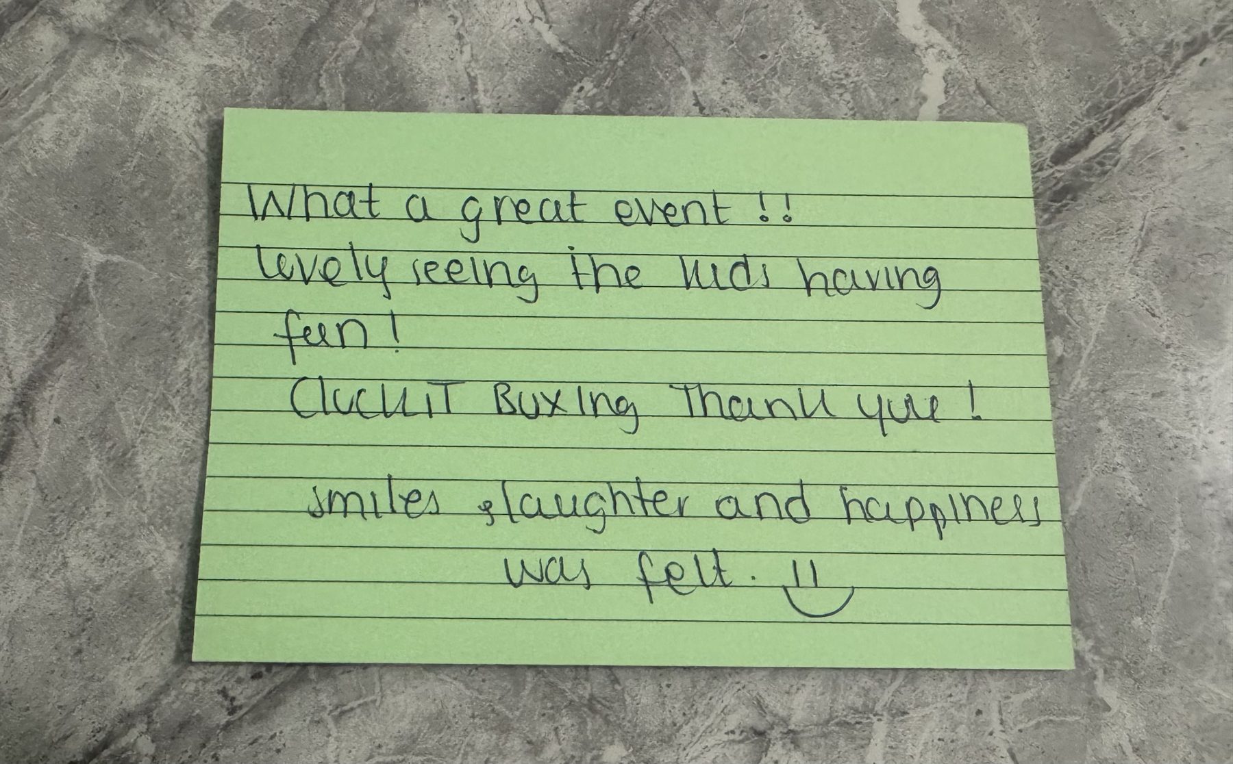 Handwritten feedback card: What a great event! Lovely seeing the kids having fun. ClockiT Boxing, thank you! Smiles, laughter and happiness was felt.